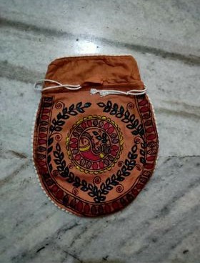 Orange Hand painted Madhubani potli bag for weddings and occasions